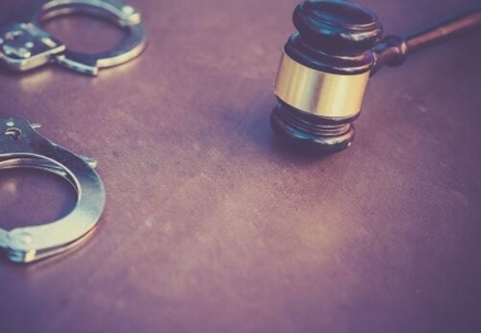 handcuffs and gavel
