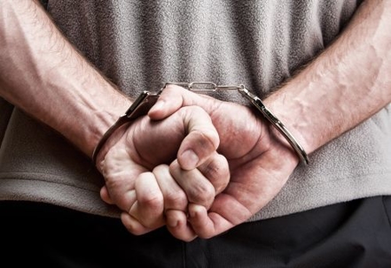 men in handcuffs